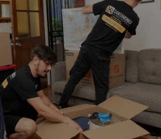 Movers packing an apartment