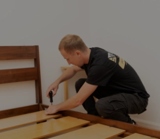Movers moving a piano
